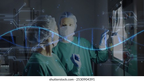 Image of dna strand and medical data over diverse female surgeons discussing x ray. Medical and healthcare services concept digitally generated image. - Powered by Shutterstock