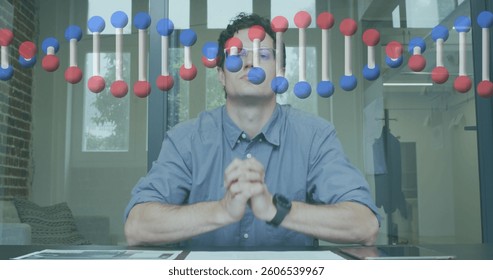 Image of dna strand over businessman in office. global business, data processing and digital interface concept digitally generated image.
