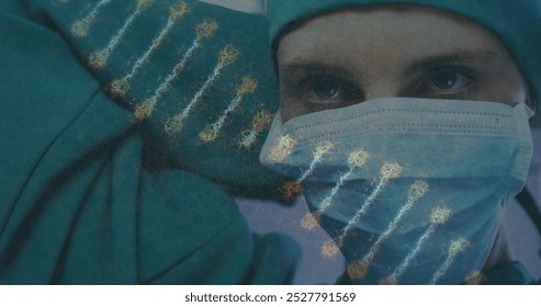 Image of dna strand over caucasian female surgeon in face mask. global research, medicine and healthcare services concept digitally generated image. - Powered by Shutterstock