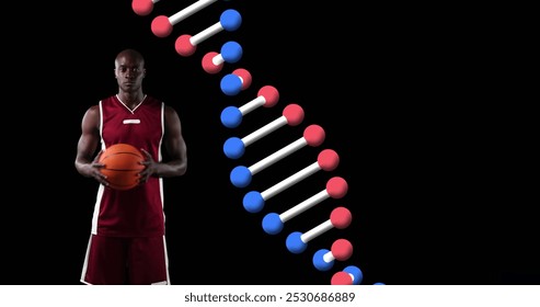 Image of dna strand over male basketball player holding ball. global sports, fitness and data processing concept digitally generated image. - Powered by Shutterstock - Get 15% off with code: PIKWIZARD15