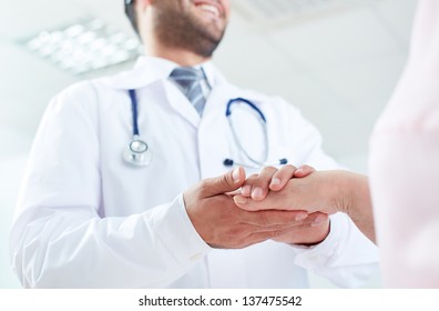 Image Of Doctor And Senior Patient Hands