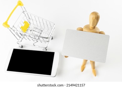 Image Of A Doll Shopping With Cashless Payment