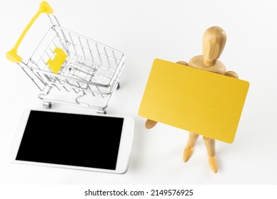 Image Of A Doll Shopping With Cashless Payment