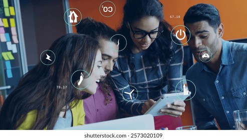 Image of ecology icons and data processing over diverse colleagues discussing work in office. Global business, ecology, computing and digital interface concept digitally generated image.