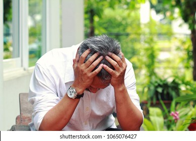 Image Of Elderly Stresness Man Facepalm Or Cover His Face By Hands.4os Or 50s Man Depressed,or May Suffering From Headaches And Migraine As Of Menopause In Men,get Trouble In His Life