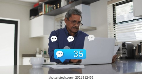 Image of emoji icons over man using laptop. Global business networks data processing technology and digital interface concept digitally generated image. - Powered by Shutterstock