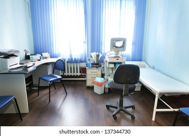 The image of an empty doctor's consulting room