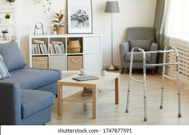 Image Of Empty Domestic Living Room With Walker For Senior People