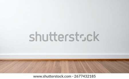 Image of an empty room featuring a white wall, white baseboard, and light brown wood floor. Isolated on white background.