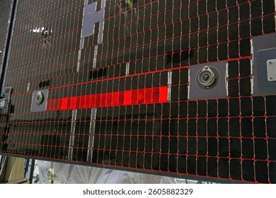 Image of encryption text, binary codes and circuit board pattern over server room. Image of screens with data processing against computer server room. Elements of this image furnished by NASA