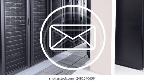 Image of envelope in circle over data server racks in server room. Digital composite, message, shape, network security, data center, networking, technology and network server concept.