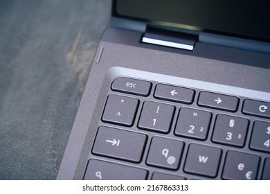 An image of the ESC key on a notebook keyboard