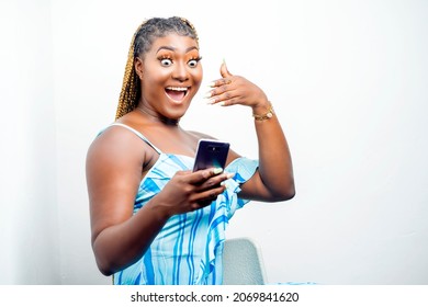 Image Of Excited African Lady With Smart Phone- Indoor Communication Concept