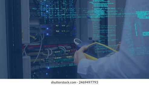 Image of eye over hands of caucasisn man checking servers and data processing. network, data processing and technology concept digitally generated image.