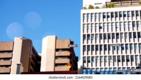 Image of falling social media icons and emojis over cityscape. social media and communication concept digitally generated image. - Powered by Shutterstock