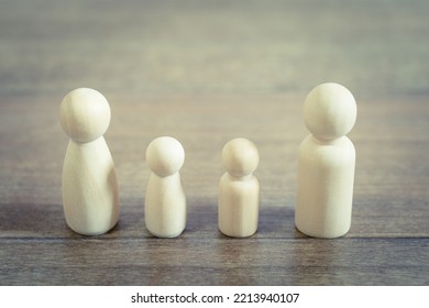 Image of a family (peg doll)