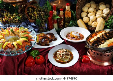 Image Of A Feast Of Different Foods On A Decorative Table