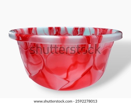 The image features a red plastic tub, which can be described as an empty basin. It is categorized under tableware and dishware, serving as a mixing bowl or general-purpose bowl.