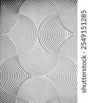 The image features a textured background with overlapping circular patterns. Each circle is detailed with concentric grooves, creating a geometric and tactile visual effect in grayscale tones.