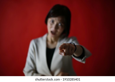 Image Of A Female Boss Scolding Her Subordinates 