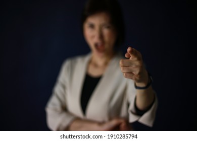 Image Of A Female Boss Scolding Her Subordinates 