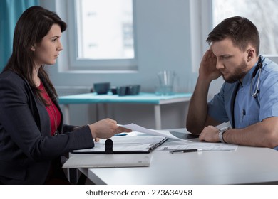 Image Of Female Lawyer In Doctor's Office