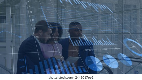 Image of financial data and graphs over diverse businesspeople talking. business, finance, economy and technology concept digitally generated image.