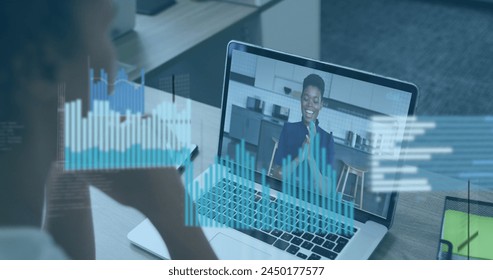 Image of financial data and graphs over african american woman having image call on laptop. Business, finance, economy and technology concept digitally generated image.