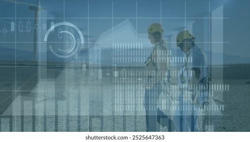 Image of financial data and graphs over diverse engineers and wind turbines, copy space. environment, sustainability, ecology, renewable energy concept digitally generated image - Powered by Shutterstock