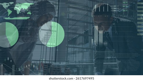 Image of financial data and graphs over diverse businessman and businesswoman working. business, finance, economy and technology concept digitally generated image.