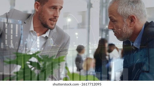 Image of financial data processing and cityscape over diverse business people in office. global business, data processing and digital interface concept digitally generated image.
