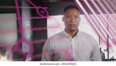 Image of financial data processing with globe over biracial businessman. Global business, finances, computing and digital interface concept digitally generated image.