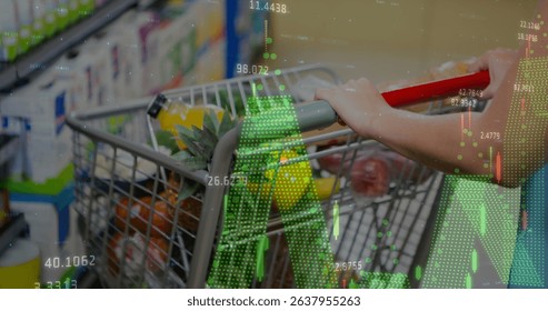 Image of financial data processing ove shopping cart. Global shopping, data processing and digital interface concept digitally generated image.