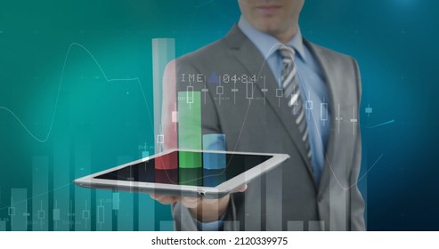 Image of financial data processing over businessman using tablet. global business, finances, digital interface and connections concept digitally generated image.