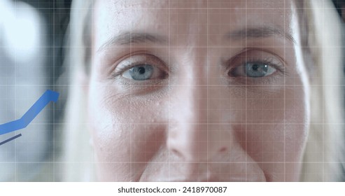 Image of financial data processing over caucasian businesswoman in office. Global finance, business, connections, computing and data processing concept digitally generated image.
