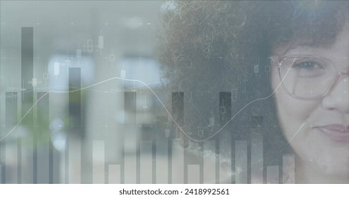 Image of financial data processing over smiling biracial businesswoman in office. Global finance, business, connections, computing and data processing concept digitally generated image.