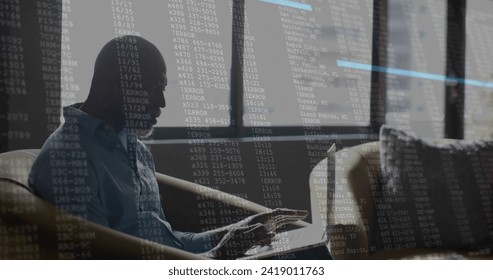 Image of financial data processing over african american businessman in office. Global finance, business, connections, computing and data processing concept digitally generated image.