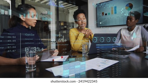 Image of financial data processing over diverse business people in office. Global business, finances, computing and data processing concept digitally generated image.