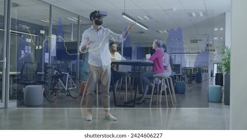 Image of financial data processing over biracial businessman using vr headset. Global business, finances, computing and data processing concept digitally generated image.