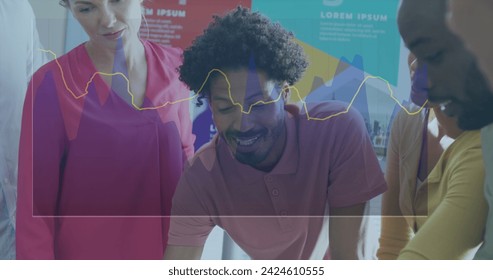 Image of financial data processing over diverse business people in office. Global business, finances, computing and data processing concept digitally generated image.