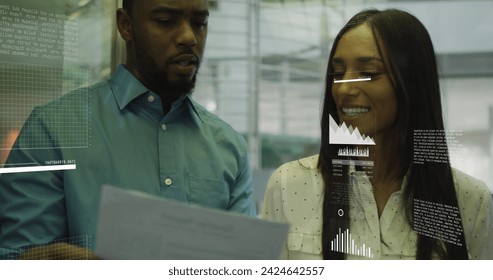 Image of financial data processing over diverse business people in office. Global business, finances, computing and data processing concept digitally generated image.