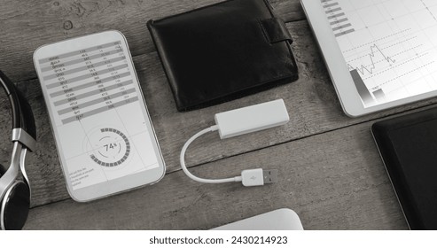 Image of financial data processing over business icons on smartphone screen. Global business, finances, computing and data processing concept digitally generated image.
