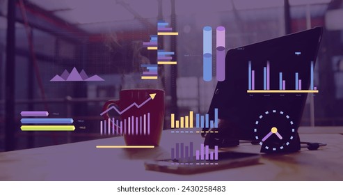 Image of financial data processing over laptop on office desk. Global business, finances, computing and data processing concept digitally generated image.