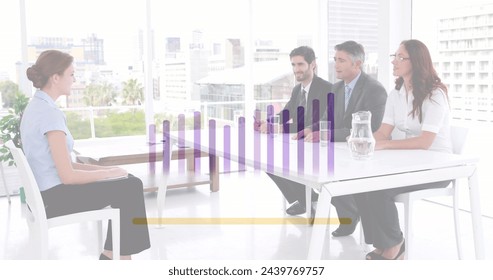 Image of financial data processing over diverse business people. Global business, finances, computing and data processing concept digitally generated image.