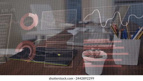 Image of financial data processing over office desk with electronic devices. Global business, finances, computing and data processing concept digitally generated image.