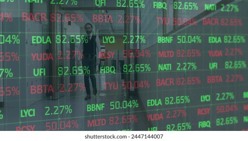 Image of financial data processing over caucasian businessman. business, digital interface and data processing concept digitally generated image.
