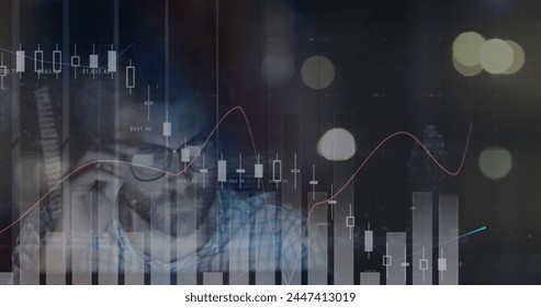 Image of financial data processing over tired man using computer. global business, data processing, digital interface, technology concept digitally generated image. - Powered by Shutterstock