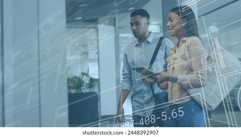 Image of financial data processing over diverse business people working in office. Global business, finances, computing and data processing concept digitally generated image.