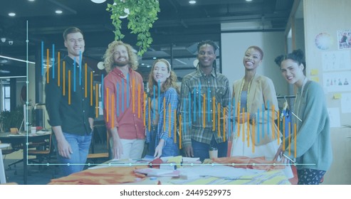 Image of financial data processing over diverse business people in office. Global business, finance, computing and data processing concept digitally generated image.