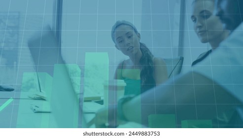 Image of financial data processing over diverse business people in office. Global finance, business, connections, computing and data processing concept digitally generated image.